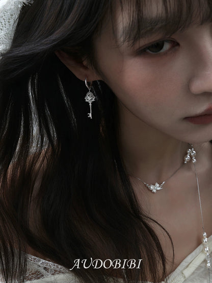 Dreaming in Lace 18K Platinum Platinum Heart Lock & Key Huggie Earrings