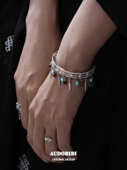 Plum Collection 18K Platinum Plating Tibet Style Feather Bangle