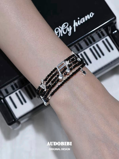 Melody Etude 18K Platinum Plating Sparkling Music Sheet Spinel Slider Bracelet